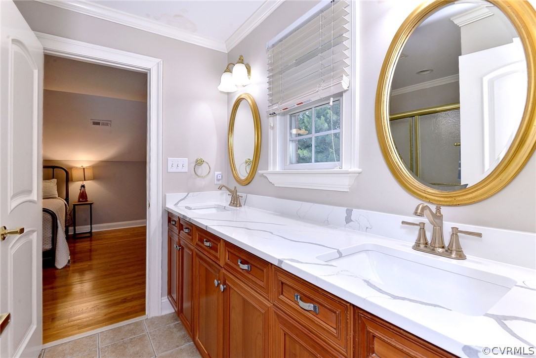 205 Portmarnoch Williamsburg, VA 23188 - Photo 33 of 49 a bathroom with a sink and a mirror