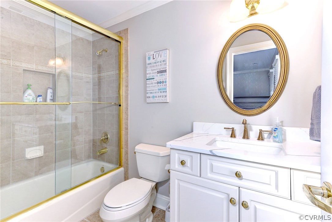 205 Portmarnoch Williamsburg, VA 23188 - Photo 36 of 49 a bathroom with a sink a toilet and a mirror