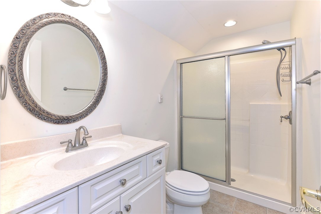 205 Portmarnoch Williamsburg, VA 23188 - Photo 40 of 49 a bathroom with a sink a mirror a toilet and a shower