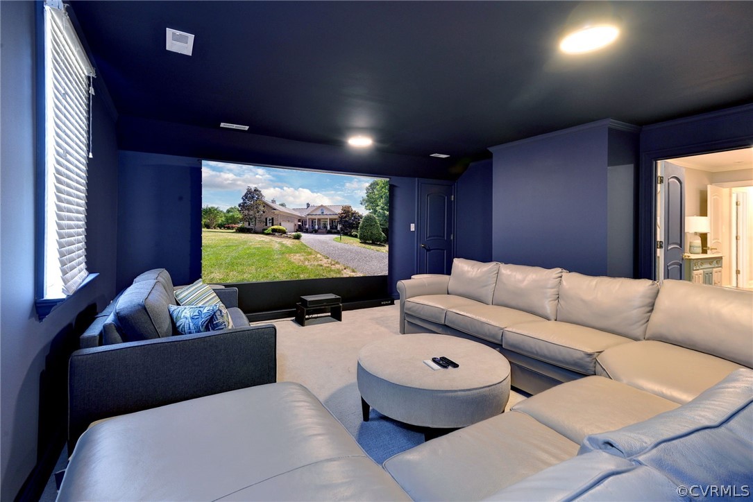 205 Portmarnoch Williamsburg, VA 23188 - Photo 41 of 49 a living room with furniture and a flat screen tv