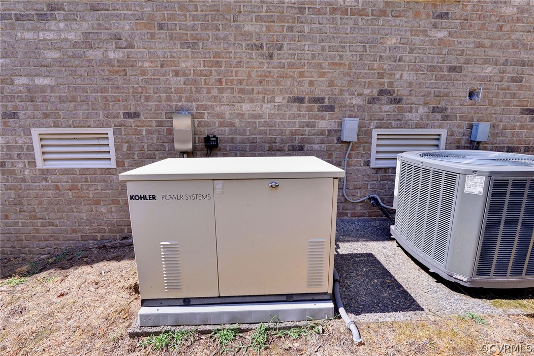 205 Portmarnoch Williamsburg, VA 23188 - Photo 47 of 49 a bathroom with a sink and a mirror