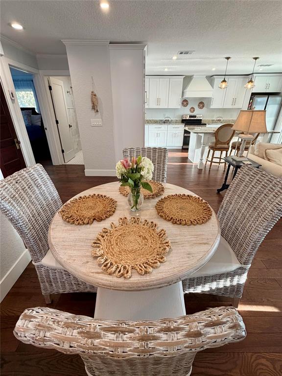 6525 Engram Road New Smyrna Beach, FL 32169 - Photo 16 of 36 a view of a dining room with furniture