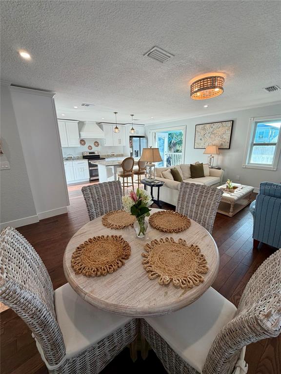 6525 Engram Road New Smyrna Beach, FL 32169 - Photo 17 of 36 a view of a dining room with furniture