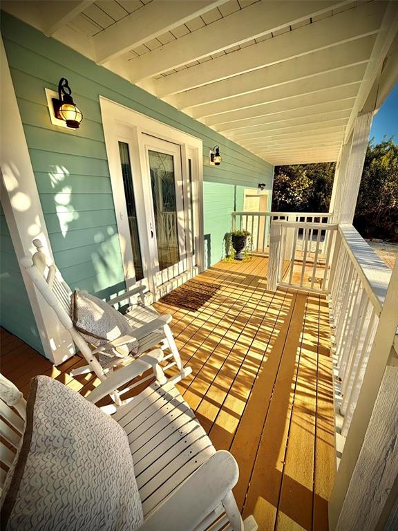 6525 Engram Road New Smyrna Beach, FL 32169 - Photo 2 of 36 a view of a bedroom with wooden floor
