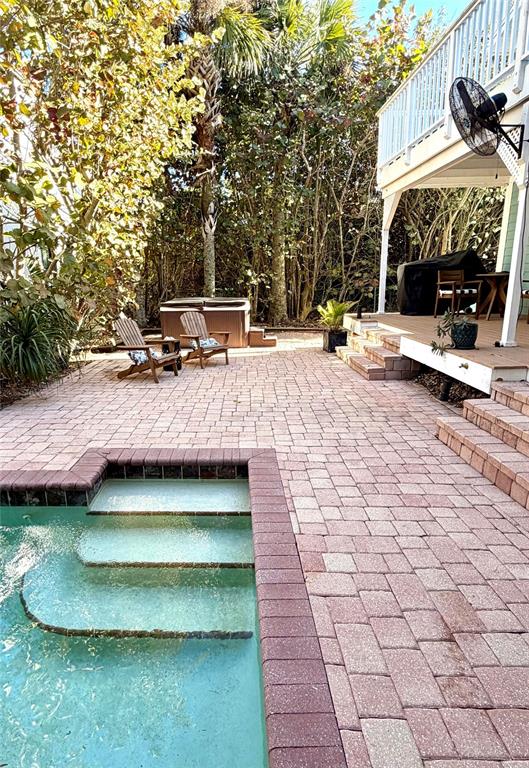 6525 Engram Road New Smyrna Beach, FL 32169 - Photo 33 of 36 a view of a swimming pool with a patio
