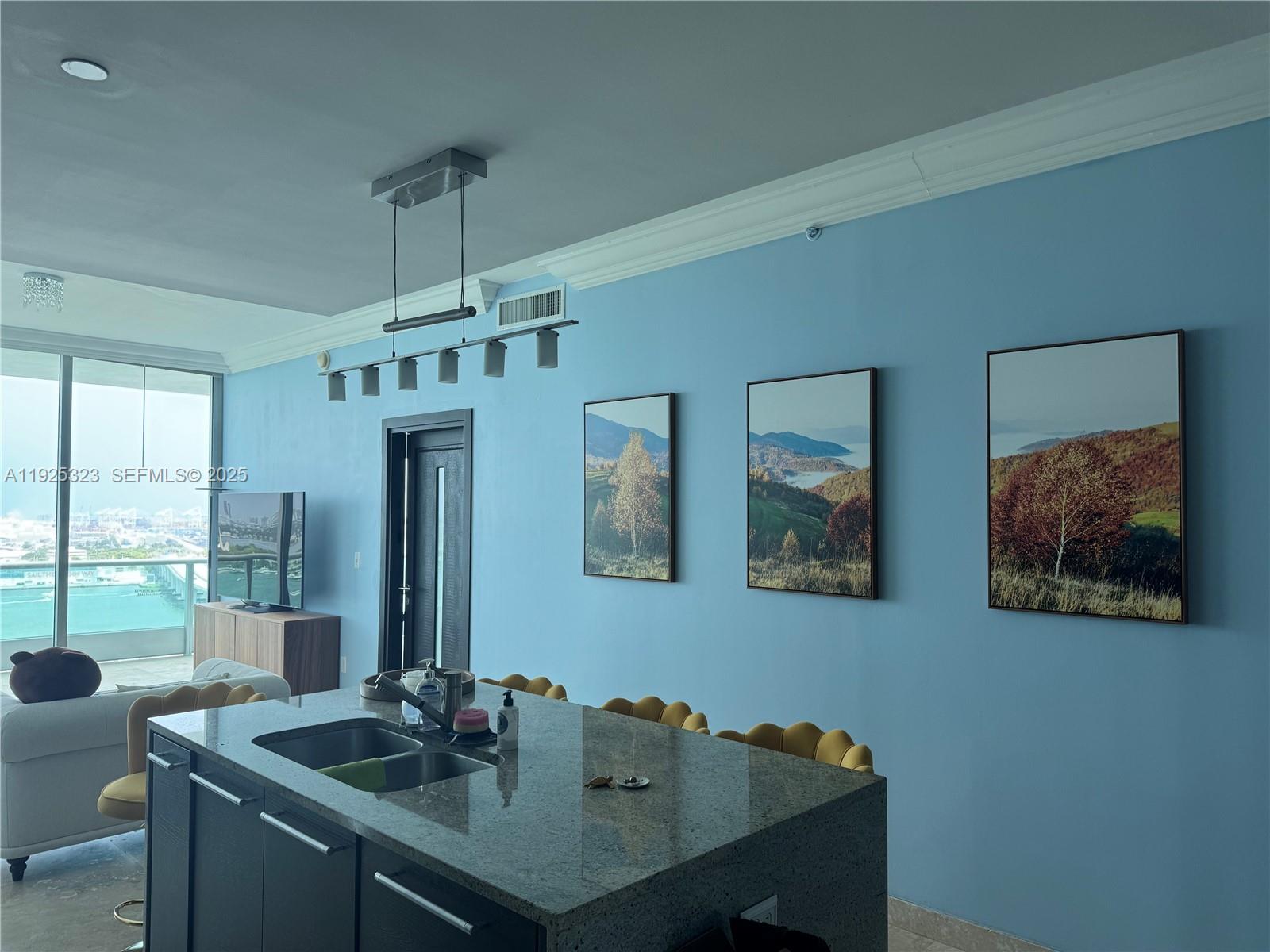 900 Biscayne Boulevard, Unit 2604 Miami, FL 33132 - Photo 19 of 59 a view of a dining room with furniture window and outside view