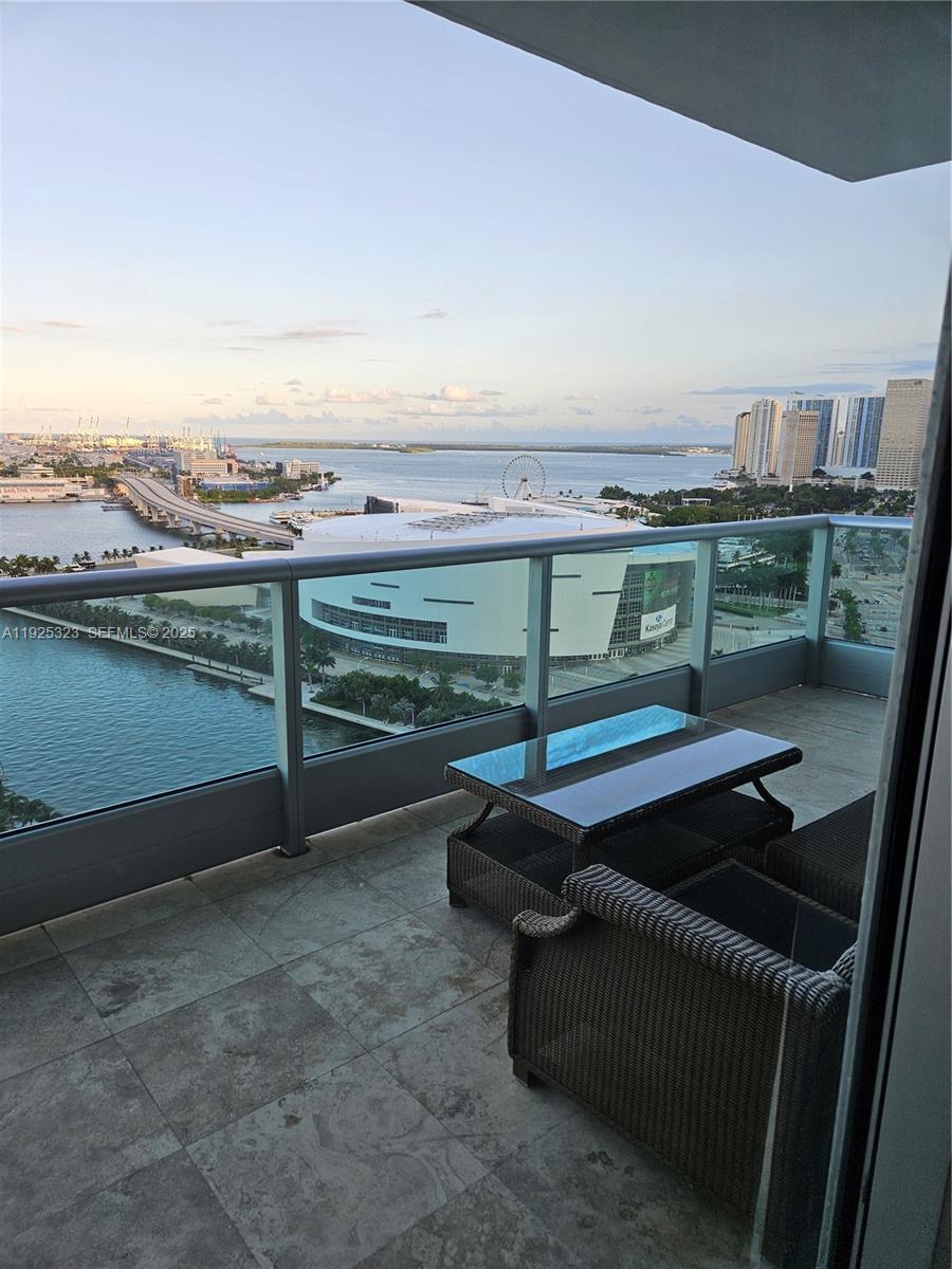 900 Biscayne Boulevard, Unit 2604 Miami, FL 33132 - Photo 10 of 59 a terrace with outdoor seating