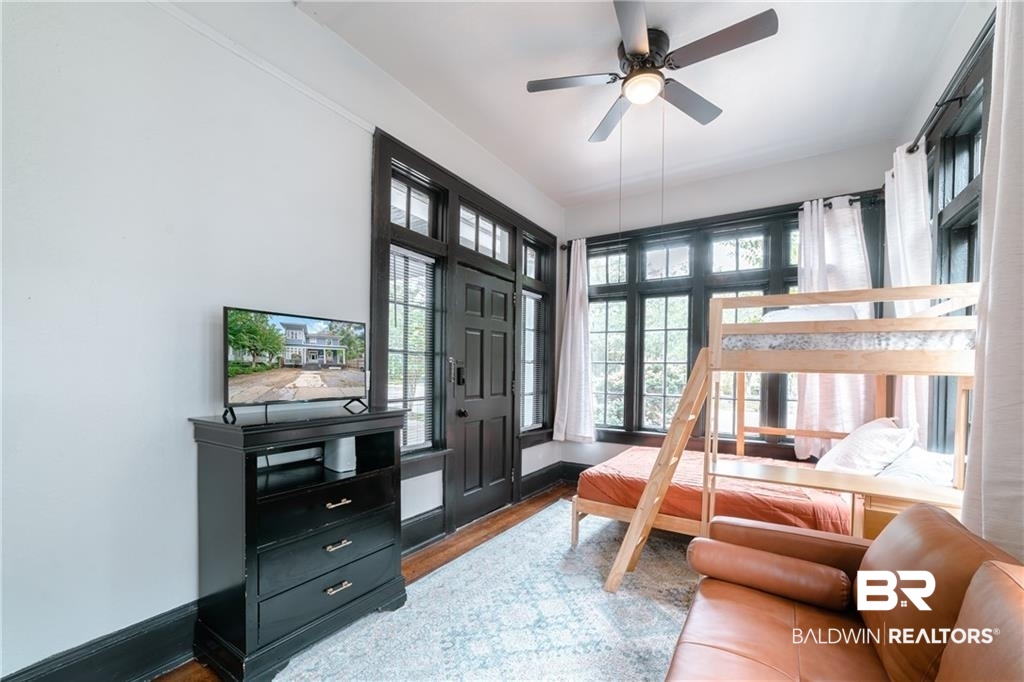 207 Michigan Avenue Mobile, AL 36604 - Photo 13 of 31 Bedroom with wood finished floors and ceiling fan