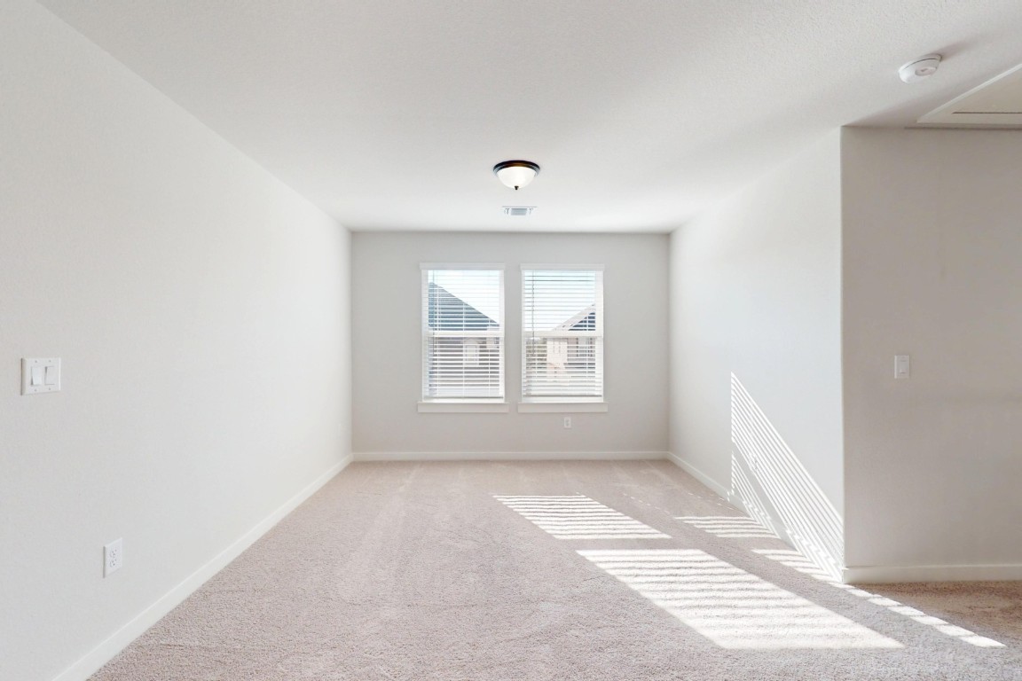 3965 Waco Way Leander, TX 78641 - Photo 18 of 38 a view of an empty room with a window