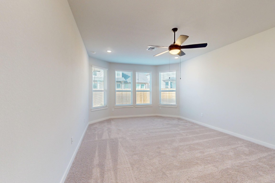 3965 Waco Way Leander, TX 78641 - Photo 26 of 38 a view of an empty room with a window
