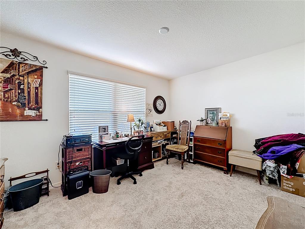 3531 Thorne Path Oxford, FL 34484 - Photo 30 of 56 a view of a workspace with furniture and a window