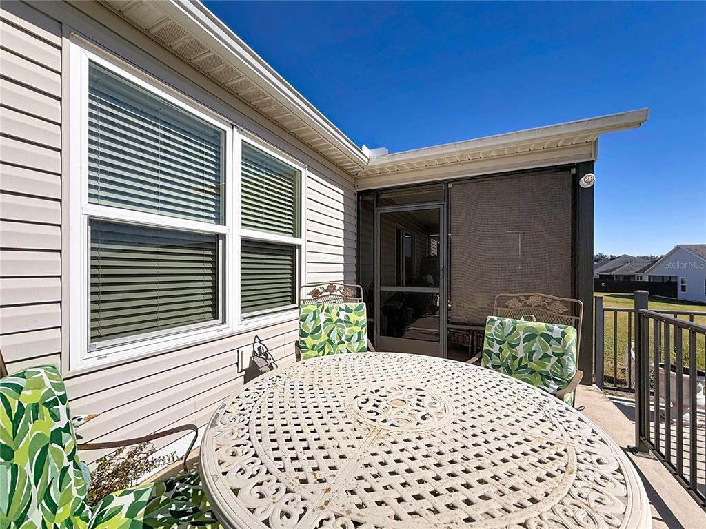 3531 Thorne Path Oxford, FL 34484 - Photo 45 of 56 a view of a patio with a table and chairs