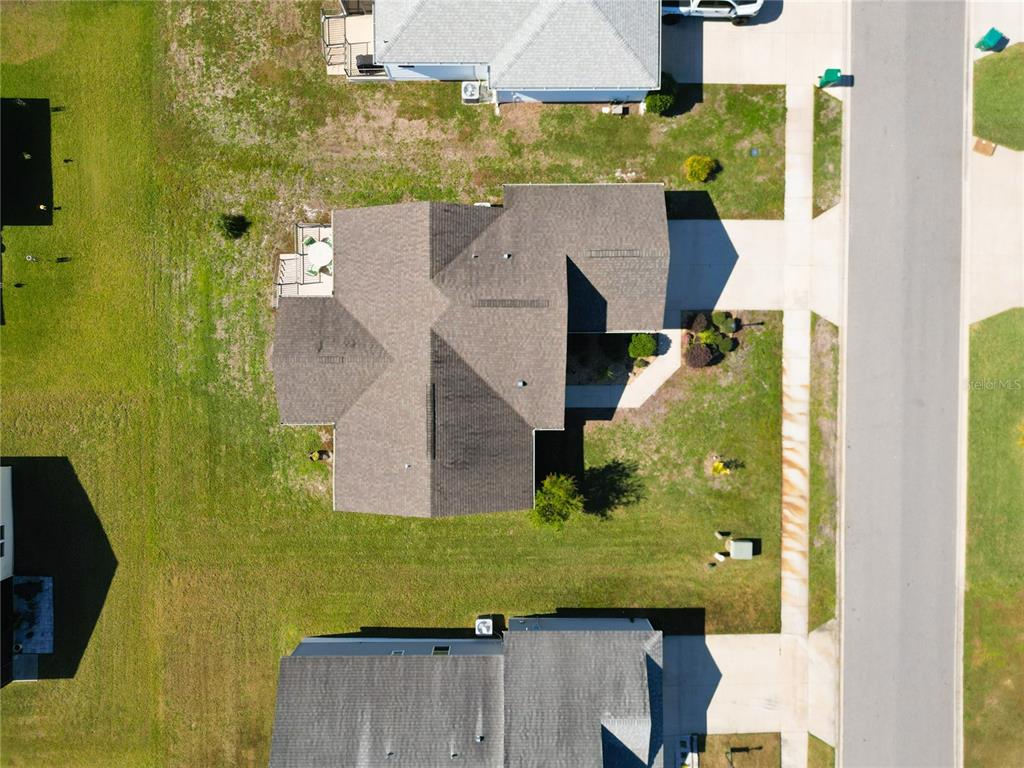 3531 Thorne Path Oxford, FL 34484 - Photo 50 of 56 an aerial view of a house with a yard