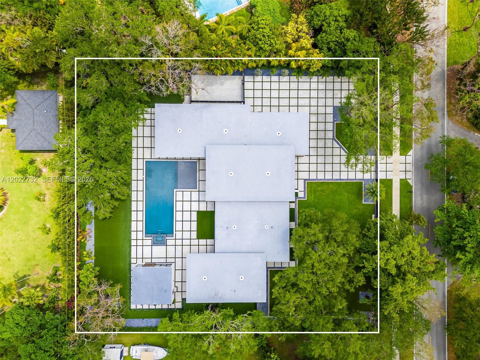 7825 Southwest 128th Street Pinecrest, FL 33156 - Photo 71 of 88 an aerial view of residential houses with outdoor space and street view