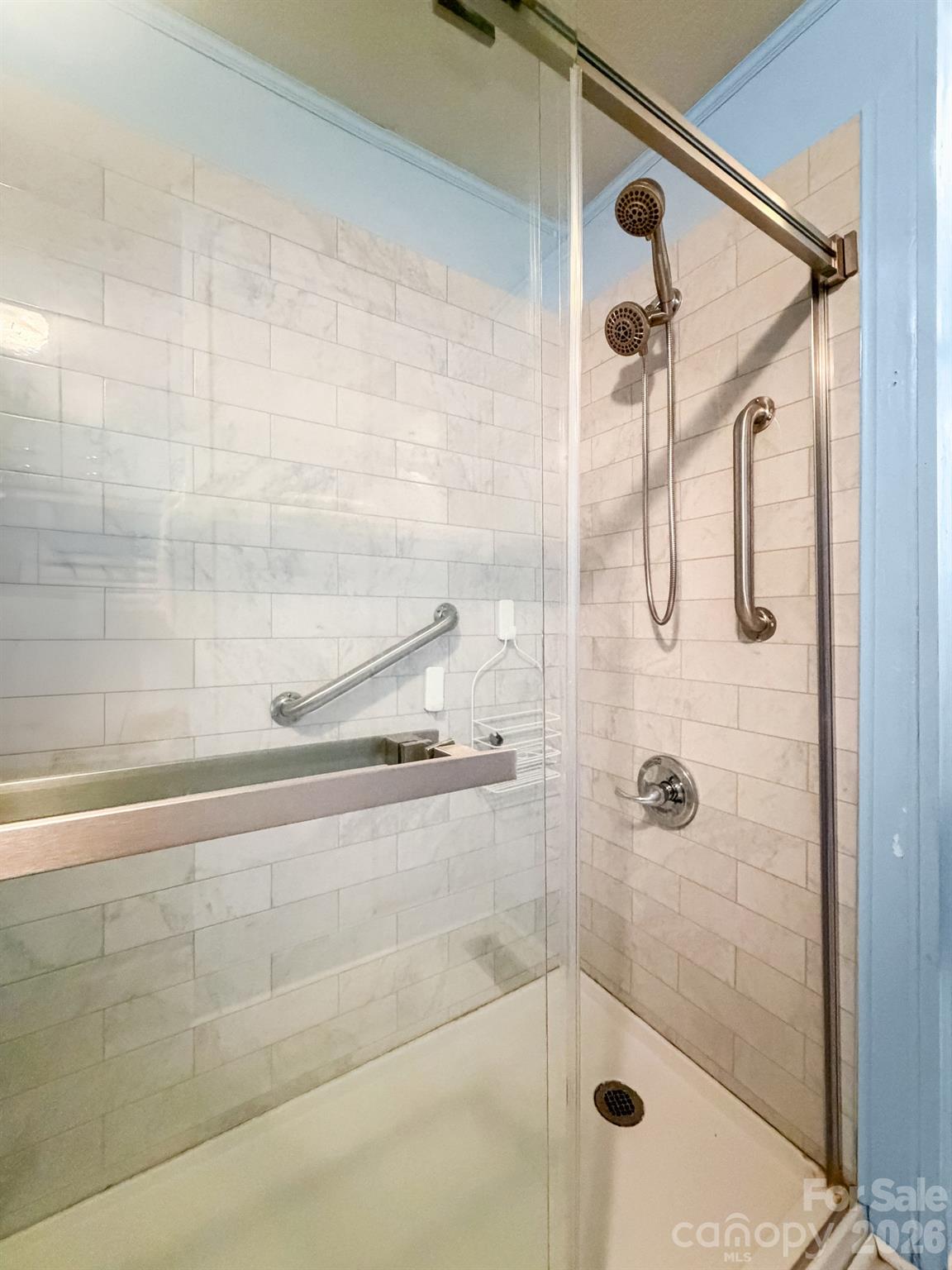 1401 East Union Street Morganton, NC 28655 - Photo 19 of 40 a bathroom with a shower