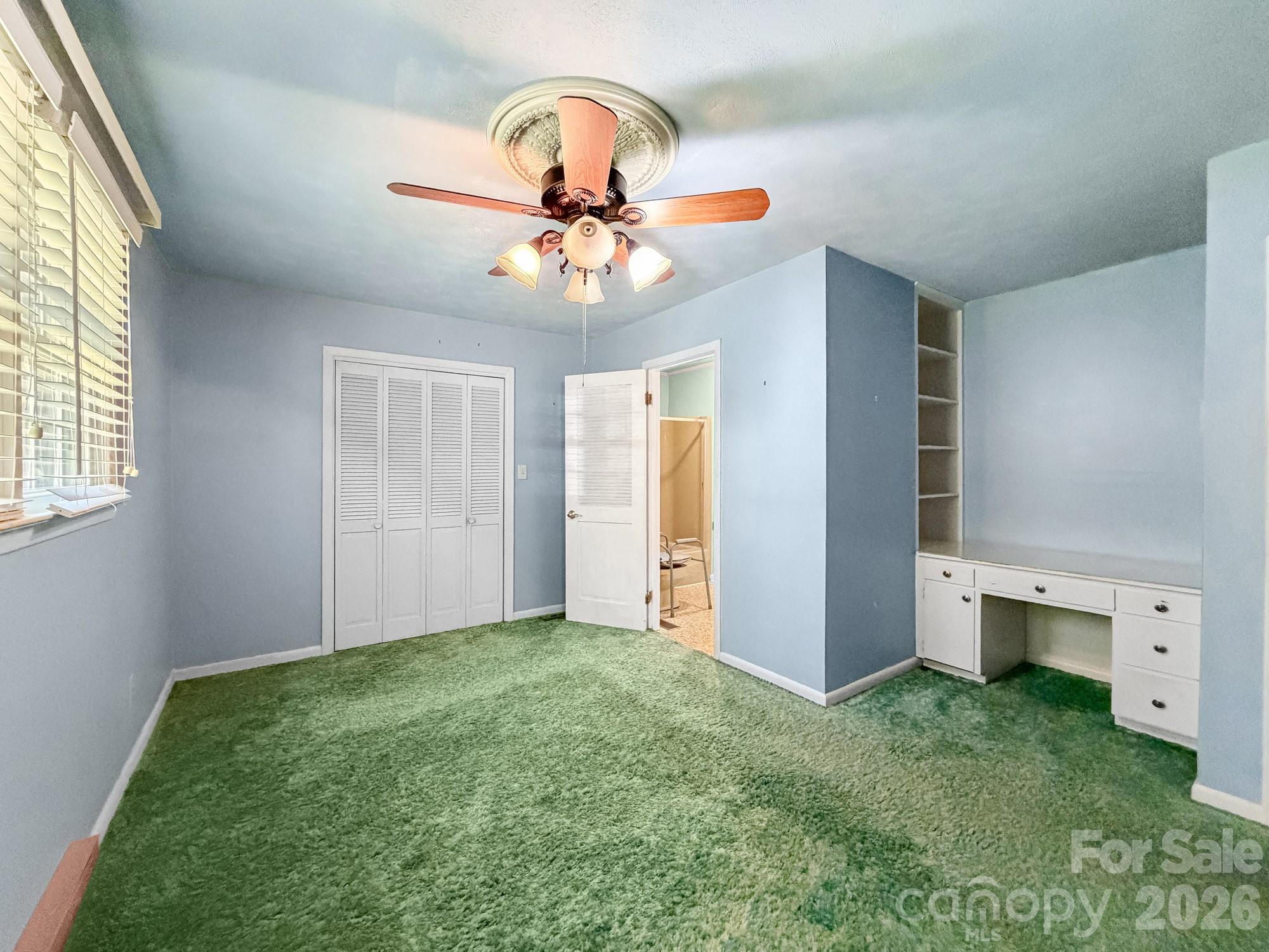 1401 East Union Street Morganton, NC 28655 - Photo 23 of 40 wooden floor in an empty room with a window
