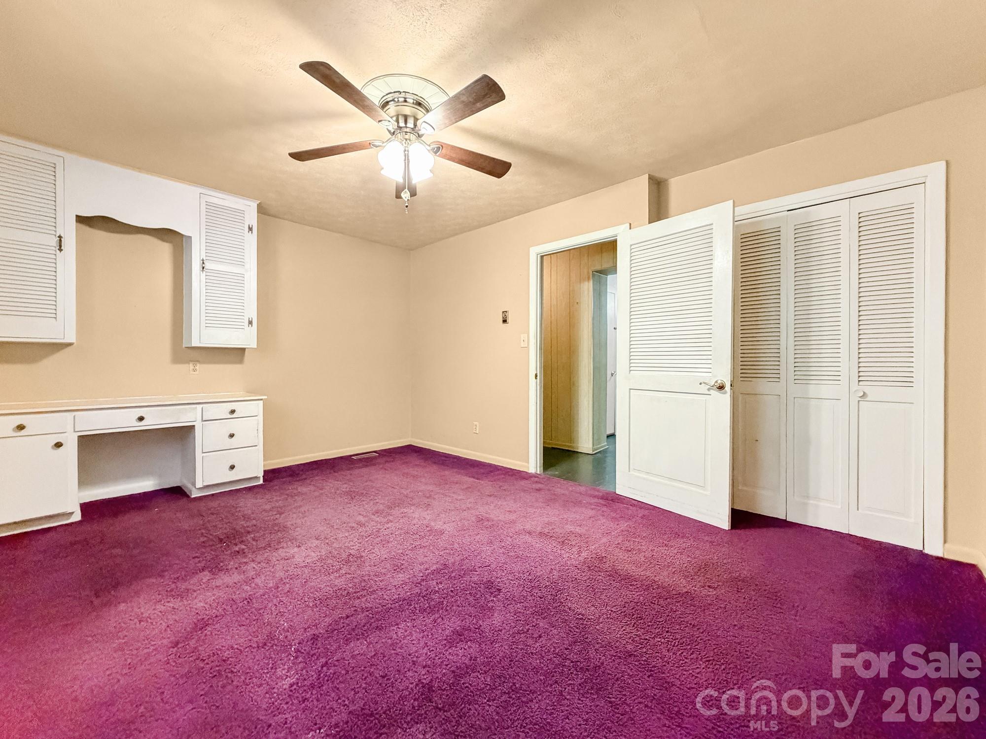 1401 East Union Street Morganton, NC 28655 - Photo 27 of 40 a view of empty room with a ceiling fan