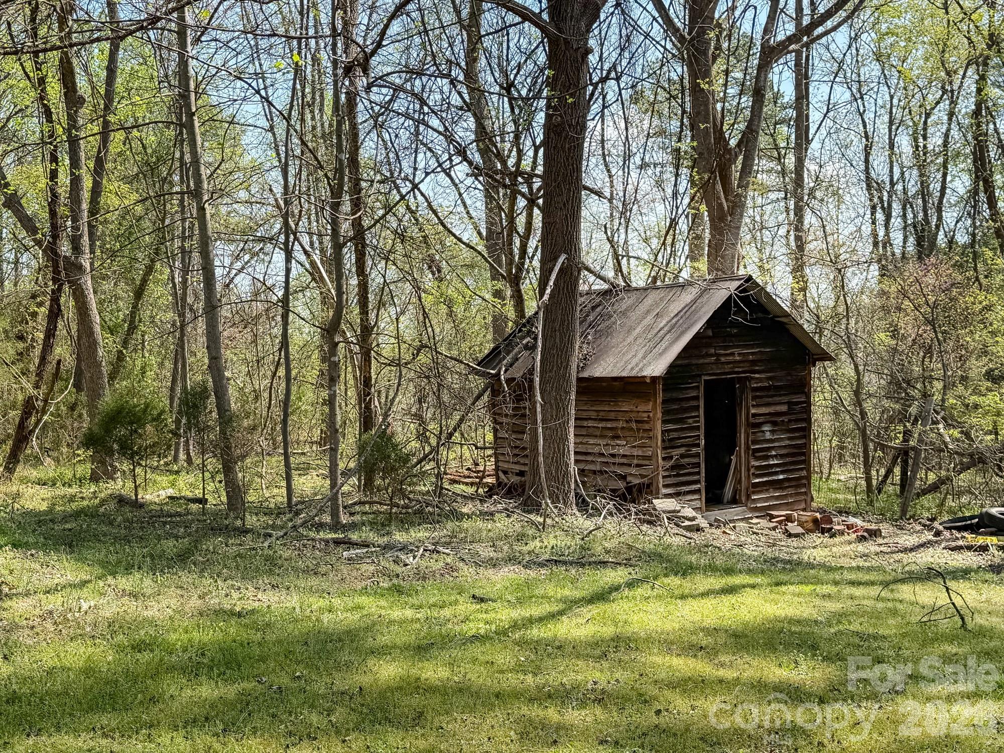 1401 East Union Street Morganton, NC 28655 - Photo 34 of 40 a view of a house with a yard and tree