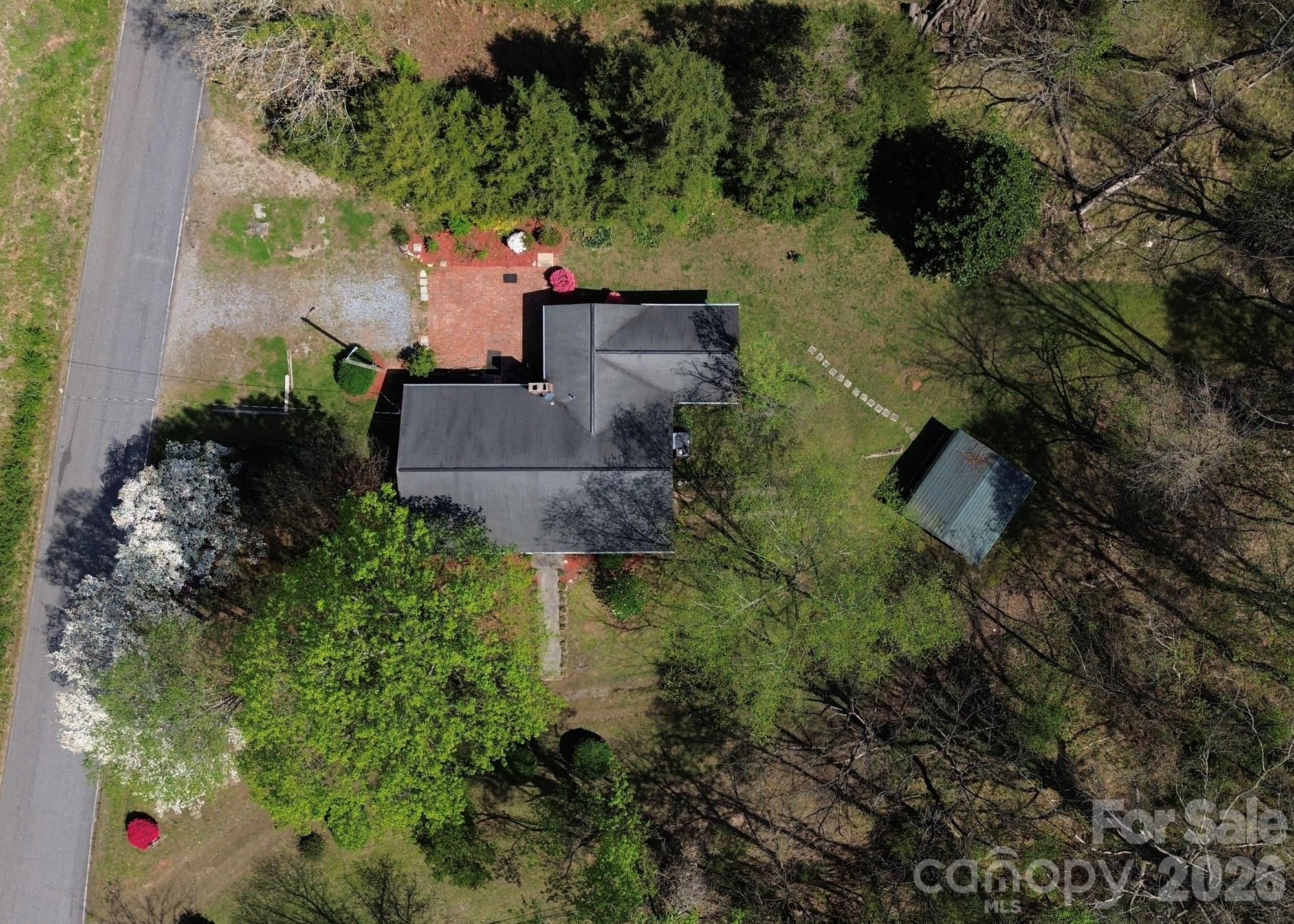 1401 East Union Street Morganton, NC 28655 - Photo 35 of 40 an aerial view of a house with a yard