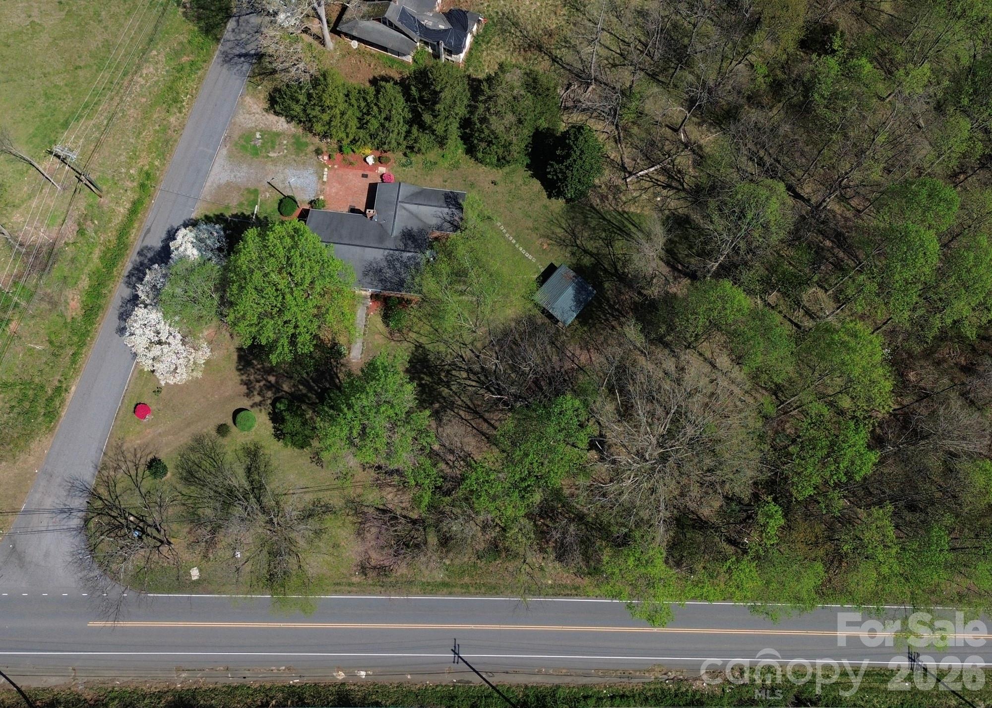 1401 East Union Street Morganton, NC 28655 - Photo 36 of 40 an aerial view of a house with a yard