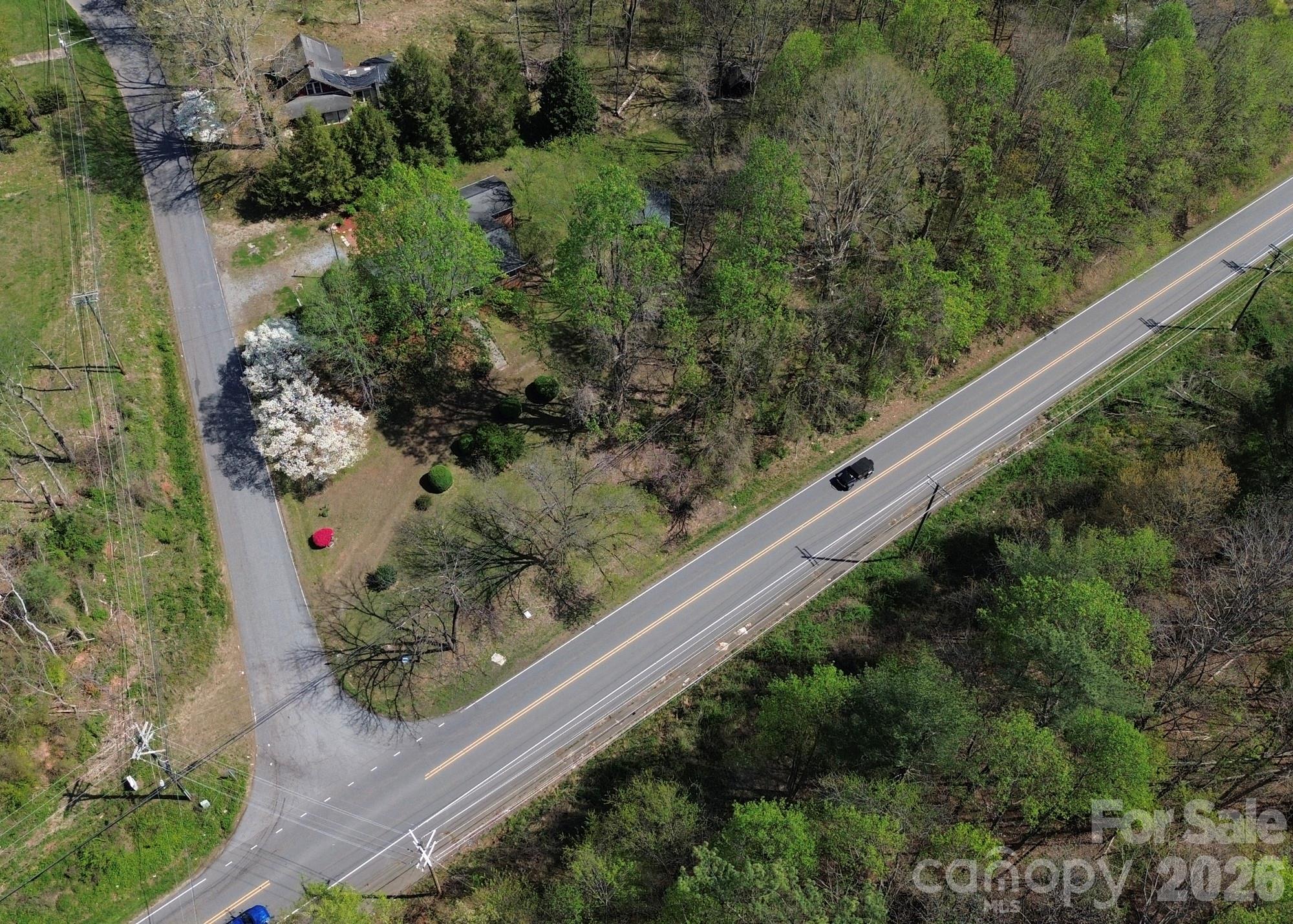 1401 East Union Street Morganton, NC 28655 - Photo 38 of 40 a view of a garden with a bench