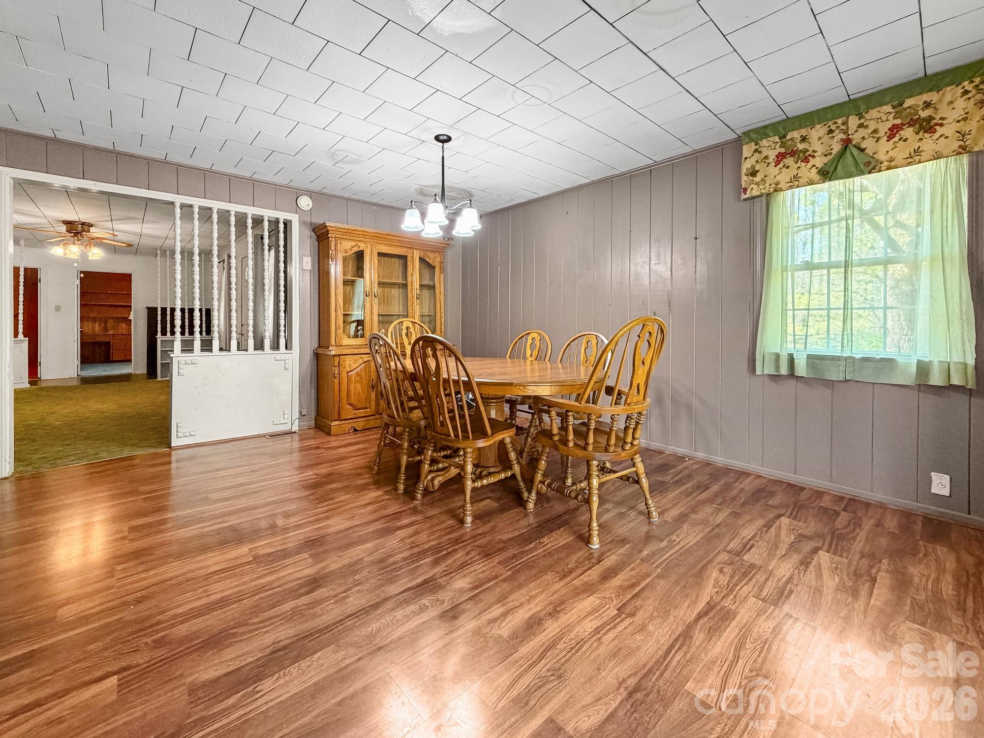 1401 East Union Street Morganton, NC 28655 - Photo 10 of 40 a view of a dining room with furniture window and wooden floor