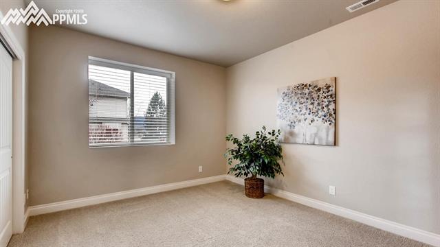15842 Maple Hill Road Monument, CO 80132 - Photo 25 of 34 3rd Bedroom - Main Level