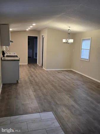 a view of a kitchen with a sink
