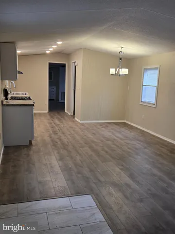 a view of a kitchen with a sink