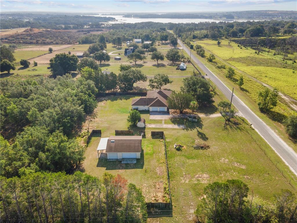 16017 Johns Lake Road Clermont, FL 34711 - Photo 4 of 62 an aerial view of residential houses with outdoor space