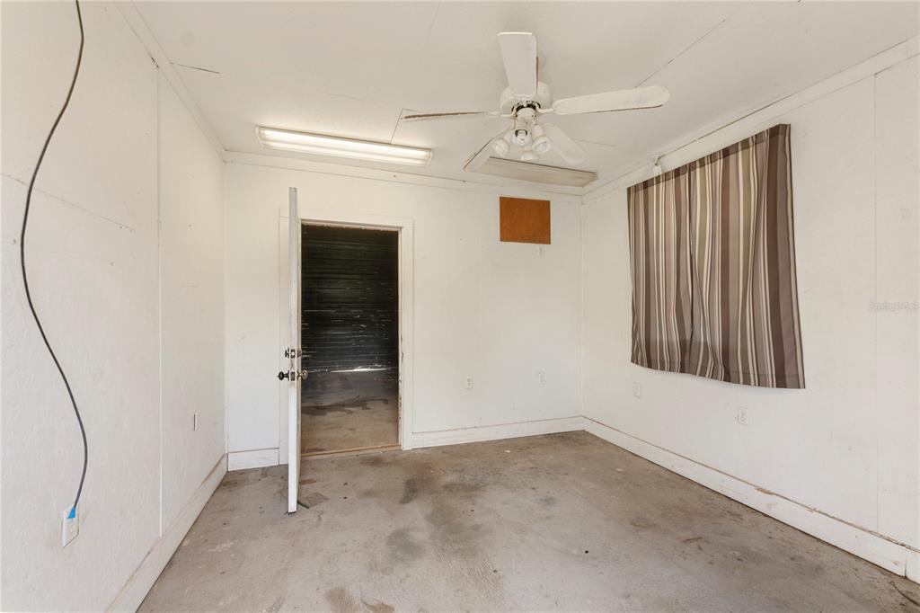 16017 Johns Lake Road Clermont, FL 34711 - Photo 44 of 62 an empty room with windows