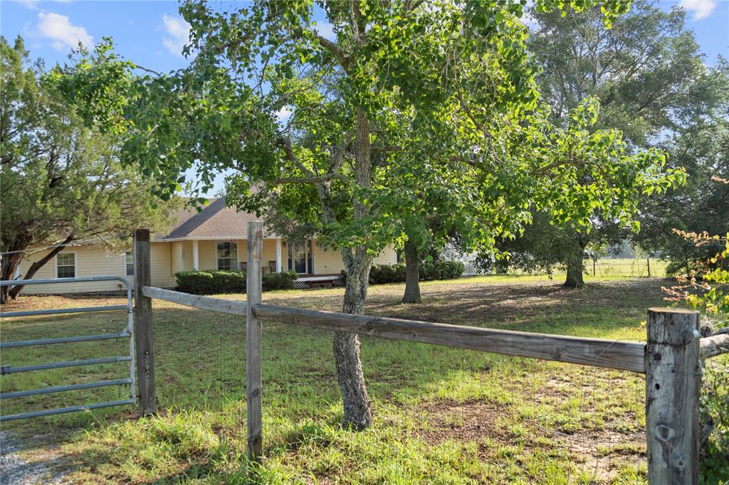 16017 Johns Lake Road Clermont, FL 34711 - Photo 5 of 62 a view of a yard in front of the house