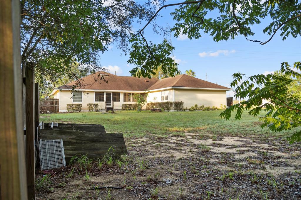 16017 Johns Lake Road Clermont, FL 34711 - Photo 52 of 62 a front view of a house with garden