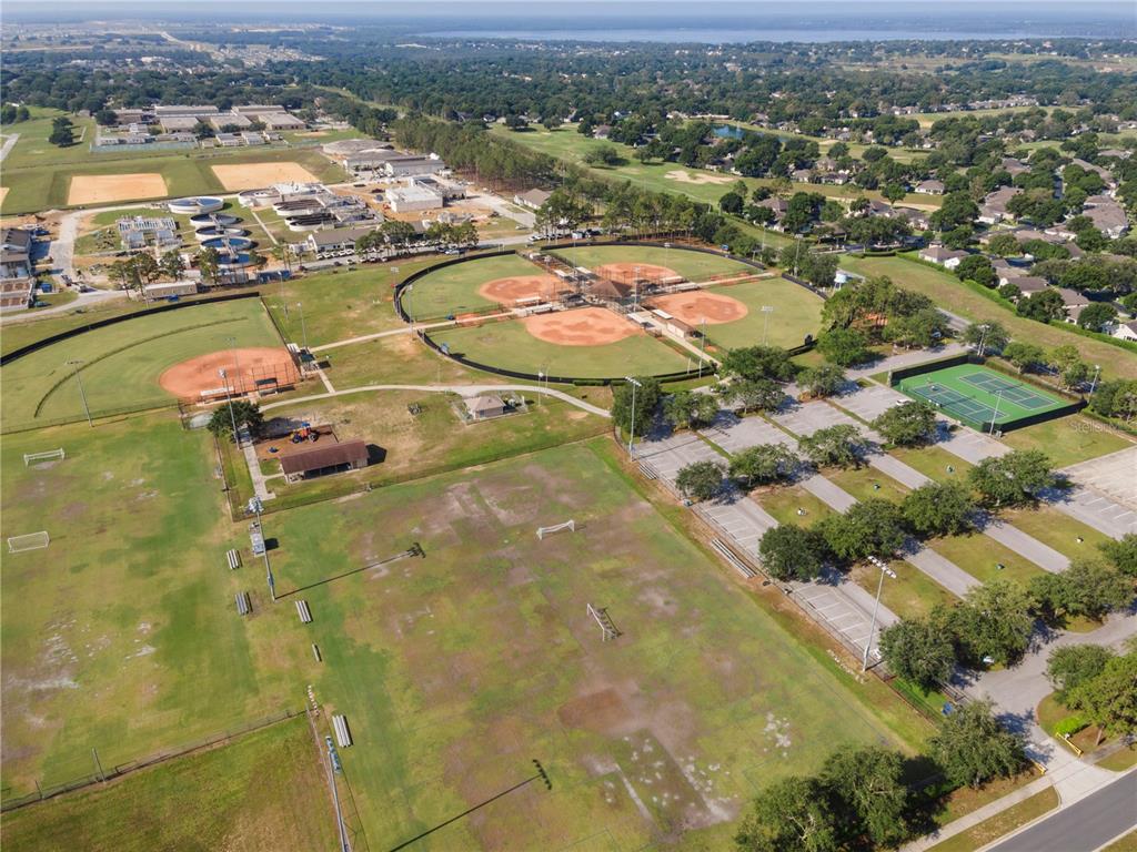 16017 Johns Lake Road Clermont, FL 34711 - Photo 57 of 62 an aerial view of residential houses with outdoor space