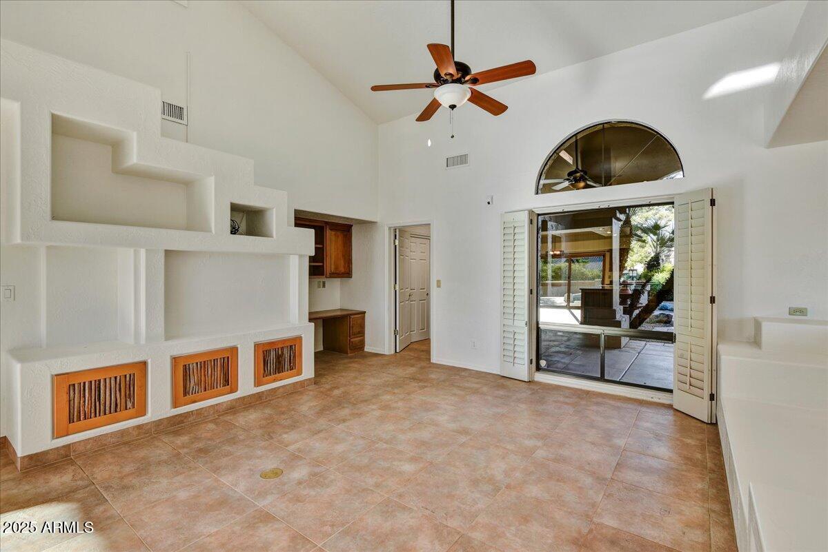 18445 East Flicker Drive Rio Verde, AZ 85263 - Photo 13 of 27 a view of livingroom and kitchen with furniture wooden floor and window