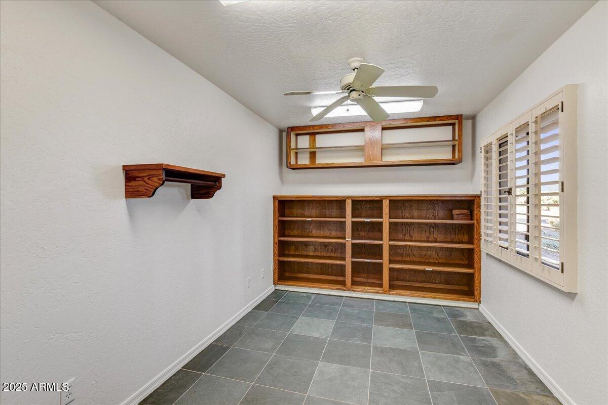 18445 East Flicker Drive Rio Verde, AZ 85263 - Photo 17 of 27 a view of an empty room with a window