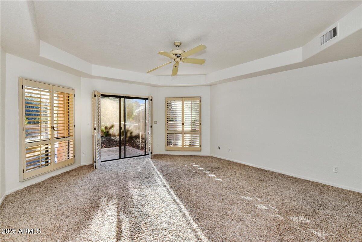 18445 East Flicker Drive Rio Verde, AZ 85263 - Photo 21 of 27 a view of an empty room with a window