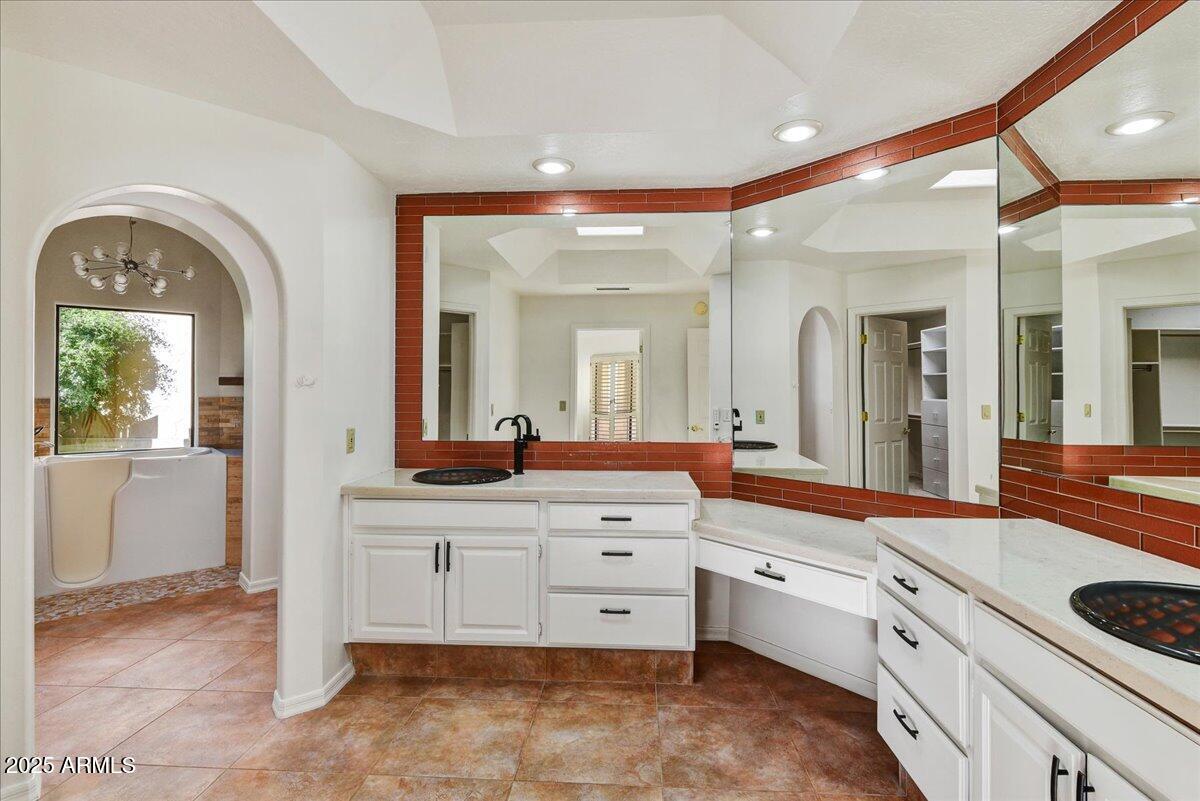 18445 East Flicker Drive Rio Verde, AZ 85263 - Photo 22 of 27 a large white bathroom with a large counter top and sink