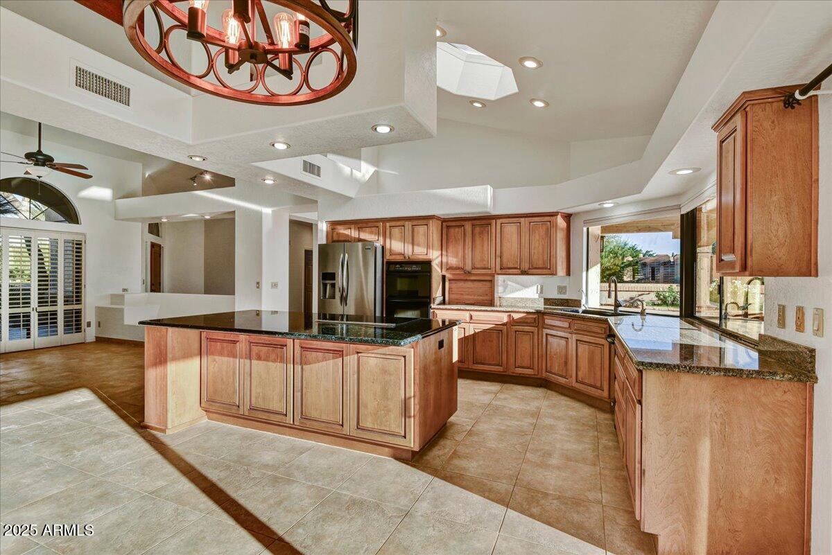 18445 East Flicker Drive Rio Verde, AZ 85263 - Photo 7 of 27 a kitchen with stainless steel appliances lots of counter top space
