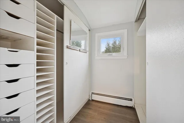 a view of an empty room and window