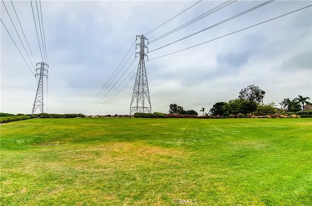 a view of a golf course with a lake