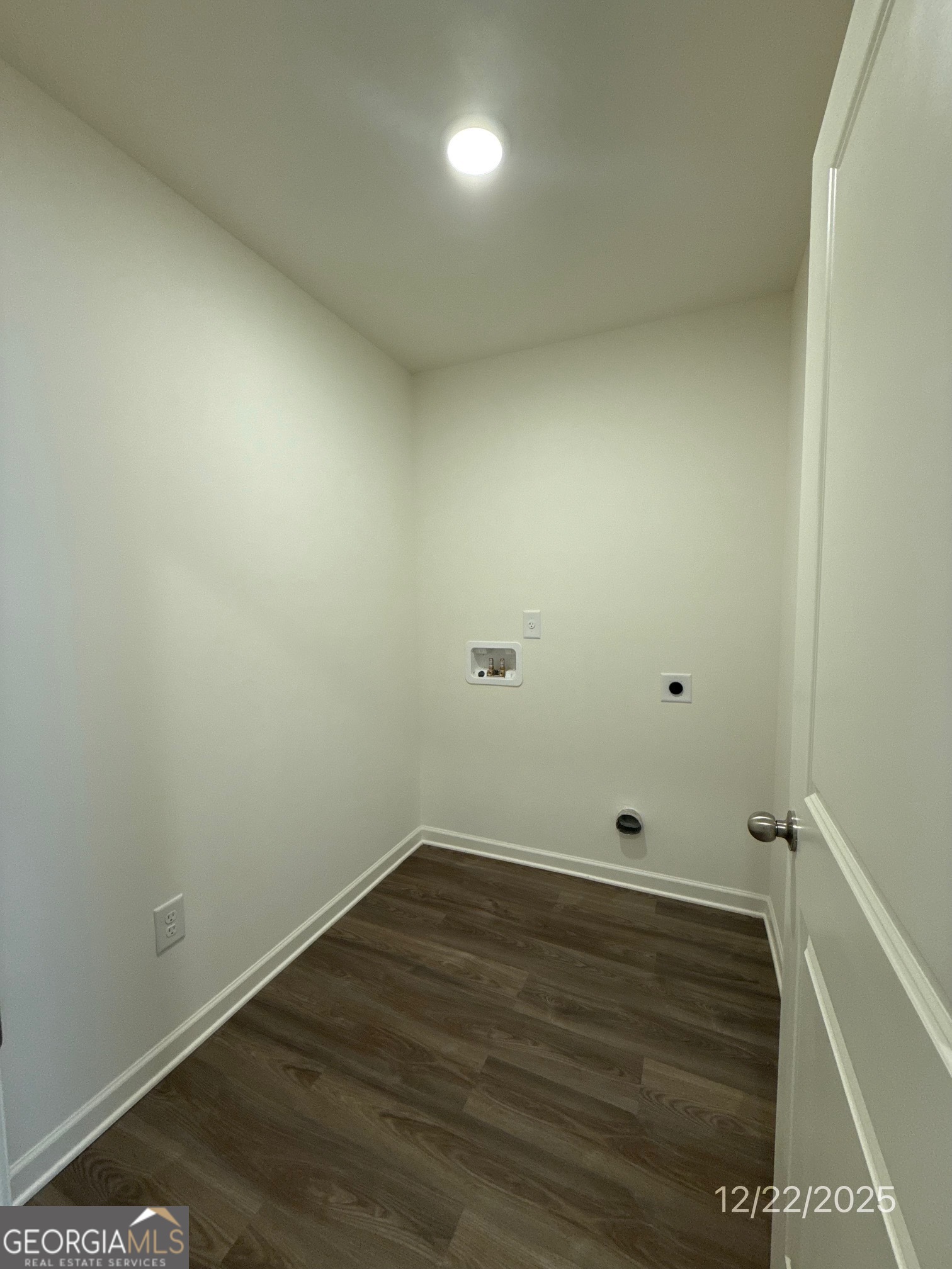 487 Grand Magnolia Street Jackson, GA 30233 - Photo 5 of 18 a view of room with wooden floor