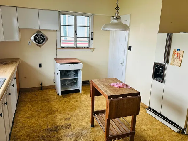 a room with furniture and a window