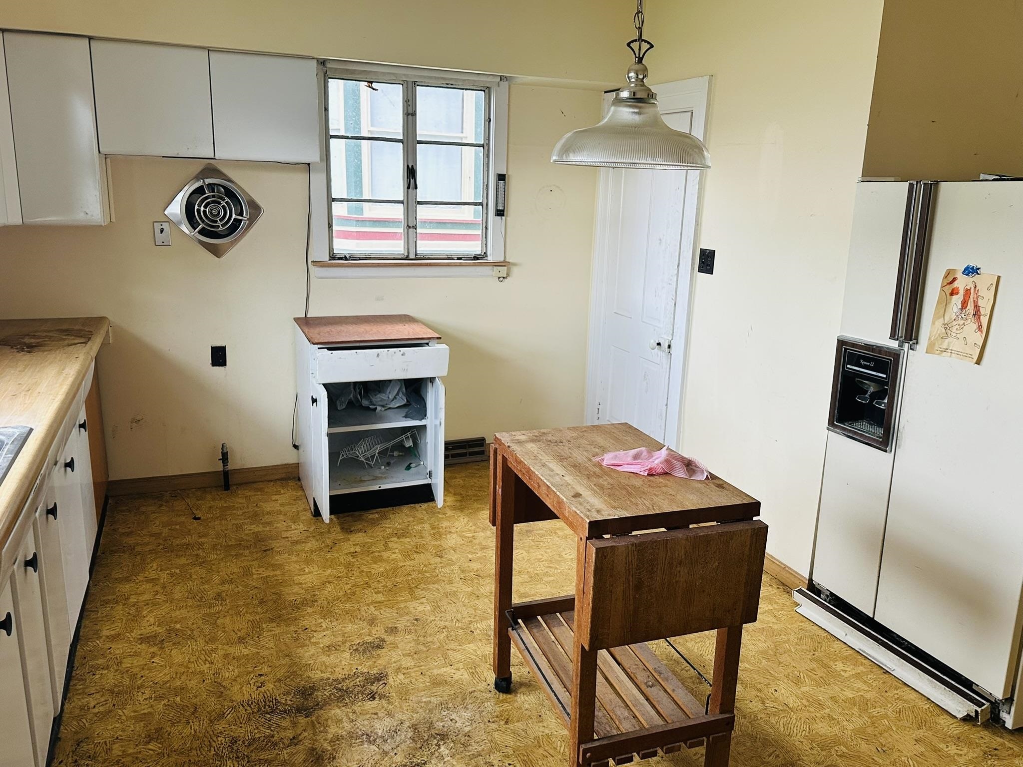 35 3rd Street Savanna, IL 61074 - Photo 13 of 20 a room with furniture and a window