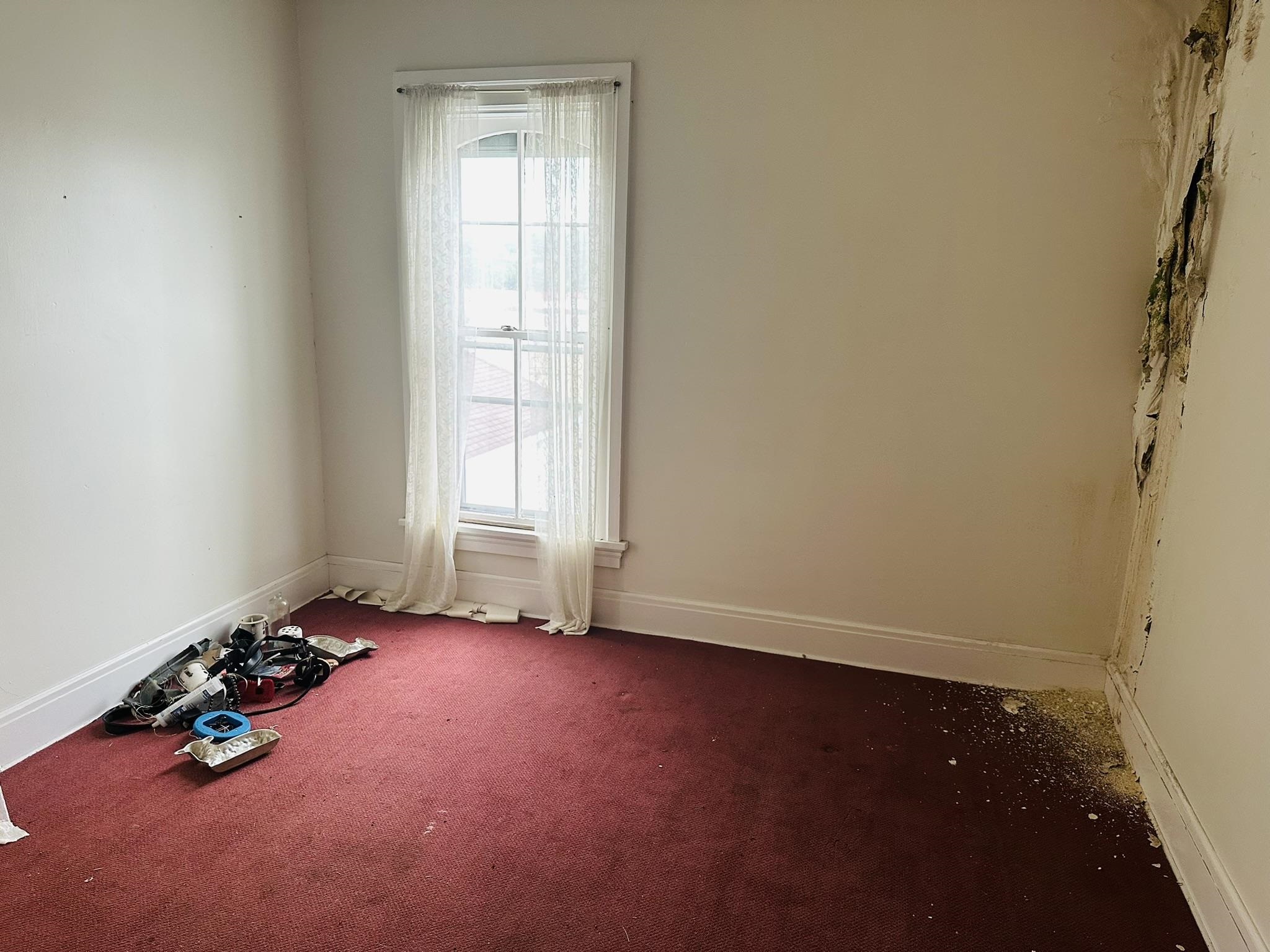 35 3rd Street Savanna, IL 61074 - Photo 15 of 20 an empty room with a window