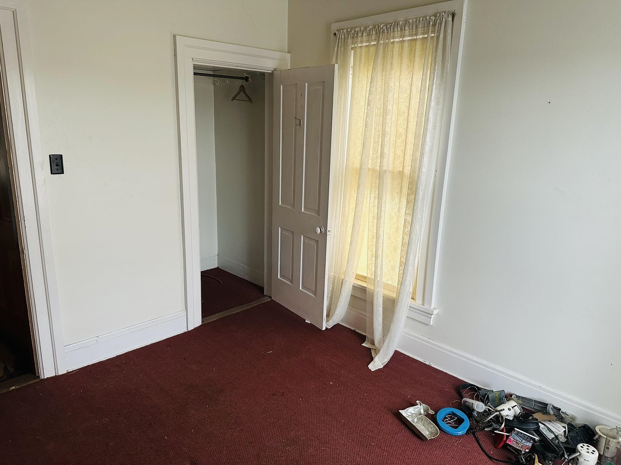 35 3rd Street Savanna, IL 61074 - Photo 16 of 20 a view of an empty room with a window