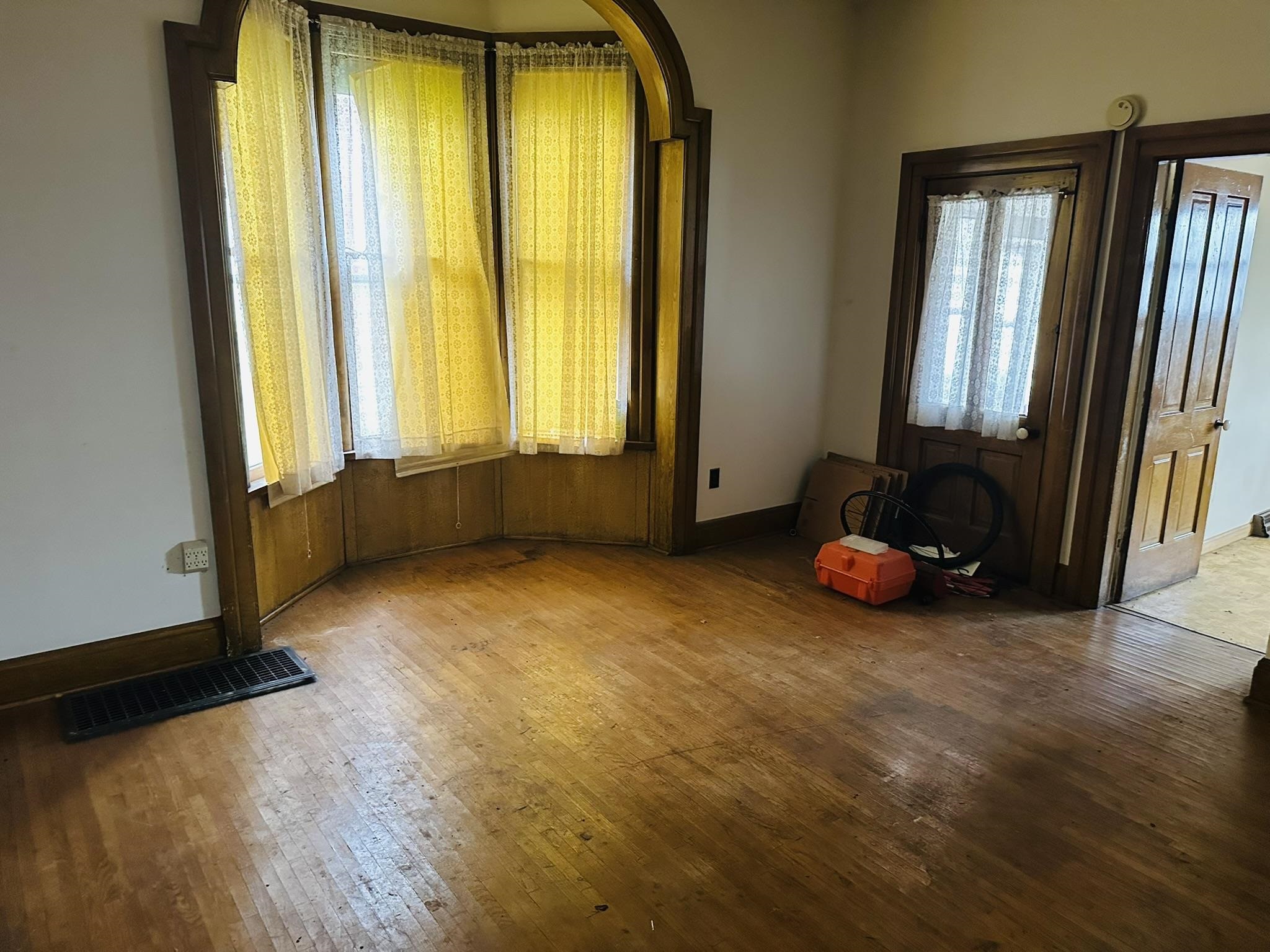 35 3rd Street Savanna, IL 61074 - Photo 8 of 20 an empty room with windows