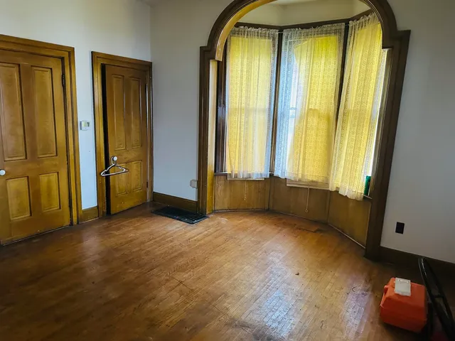 an empty room with windows