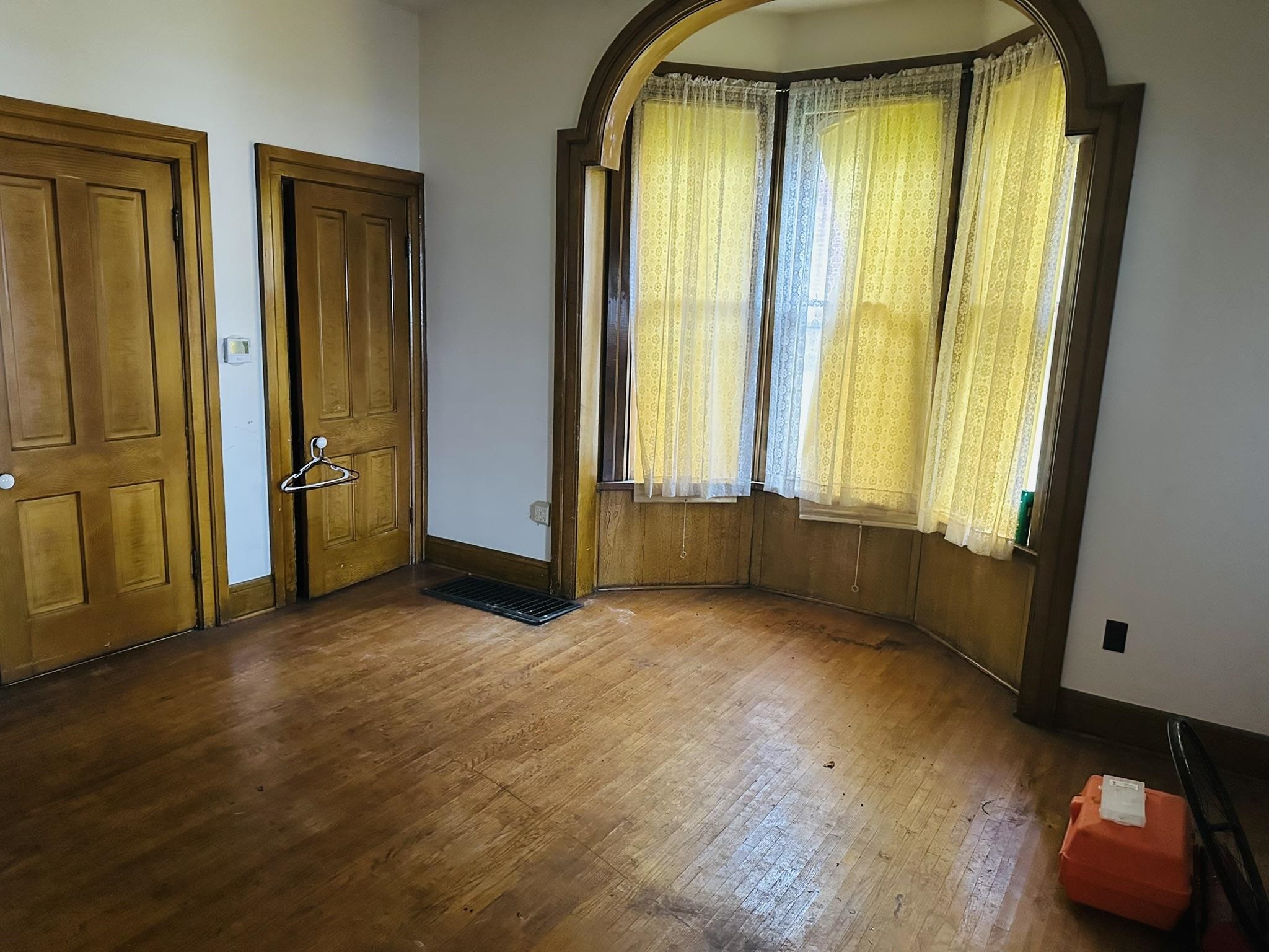 35 3rd Street Savanna, IL 61074 - Photo 9 of 20 an empty room with windows