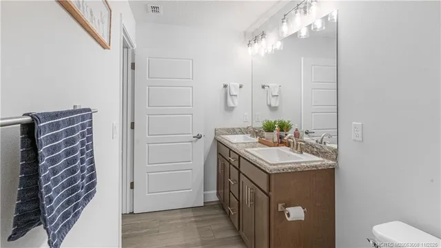 an aerial view of a house with outdoor space swimming pool